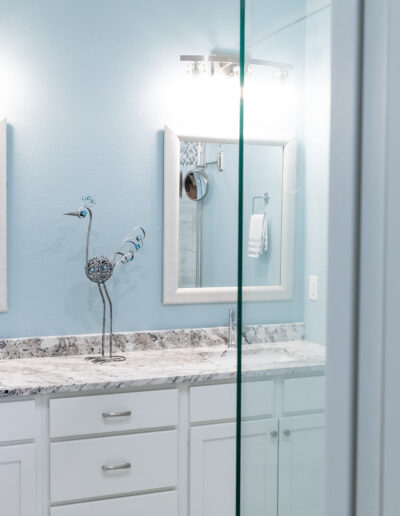 New Bathroom including vanity, mirrors, and fixtures