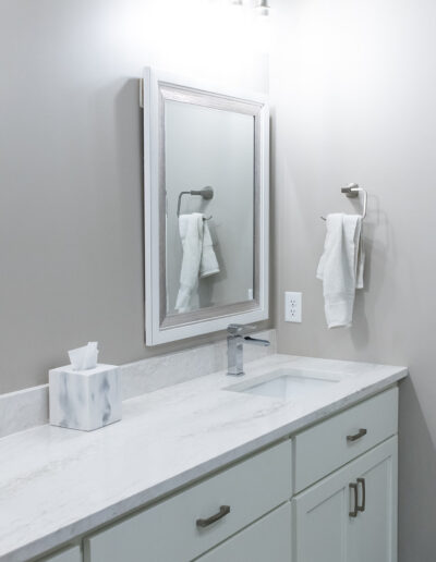 New Bathroom including vanity, mirrors, and fixtures